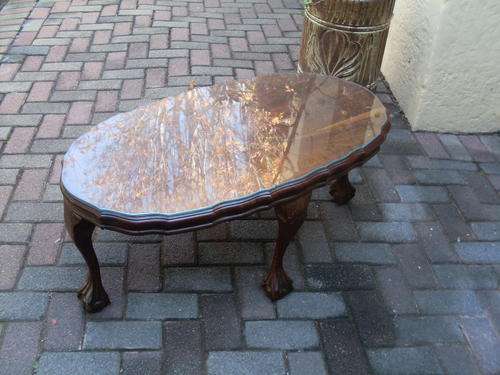 VINTAGE SOLID IBUIA WOOD BALL AND CLAW OVAL COFFEE TABLE WITH GLASS TOP