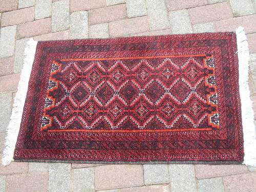 OWN YOUR PIECE OF PERSIA BALOUCH TRIBAL HAND KNOTTED RUG TYPICAL REDS ETC WITH CAMEL/ELEPHANT FOOT