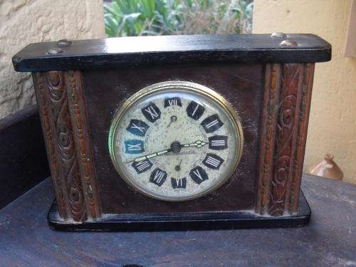 SCHWARZWALD VINTAGE ALARM AND MANTLE CLOCK ENCASED IN WOOD?BROWN & BLACK & CREAM FACE NICE OLD LOOK
