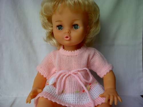 A very rare pull-string talking first love doll (wearing an original first love doll dress)