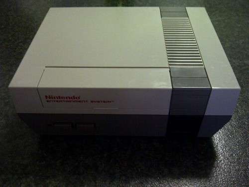 Nintendo Entertainment System (NES) 1983 includes all cables and zapper gun. Tested and working