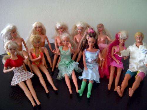 Vintage barbies most dated 1970's ( 10 barbies,1 ken), some barbies wearing original barbie clothes