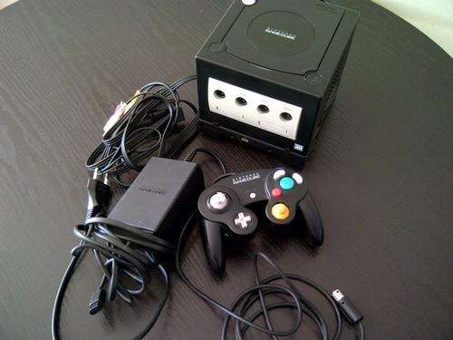 Black nintendo gamecube, with all original cables, power supply and 1 original controller
