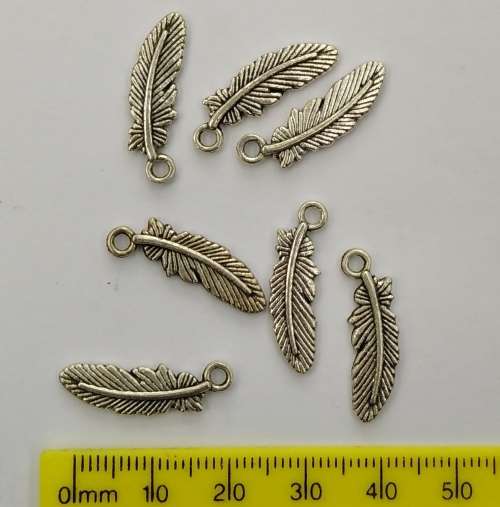 10 x Silver Feather Charms, detail on both sides. 23mm x 7mm, hole 2mm.