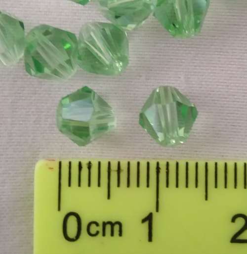 10 x Glass Bicone Beads, Light Green. 6mm x 5mm