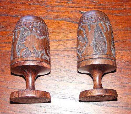 African salt and pepper pots in hardwood