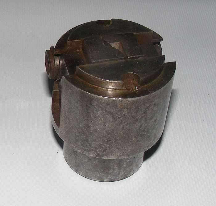 Emco star two-jaw chuck with key.