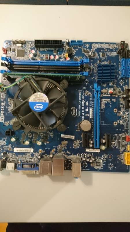 Intel i3-4130 3.4Ghz CPU with 4GB DDR3 ram ,  Intel DB85FL mainboard and 350w Power Supply