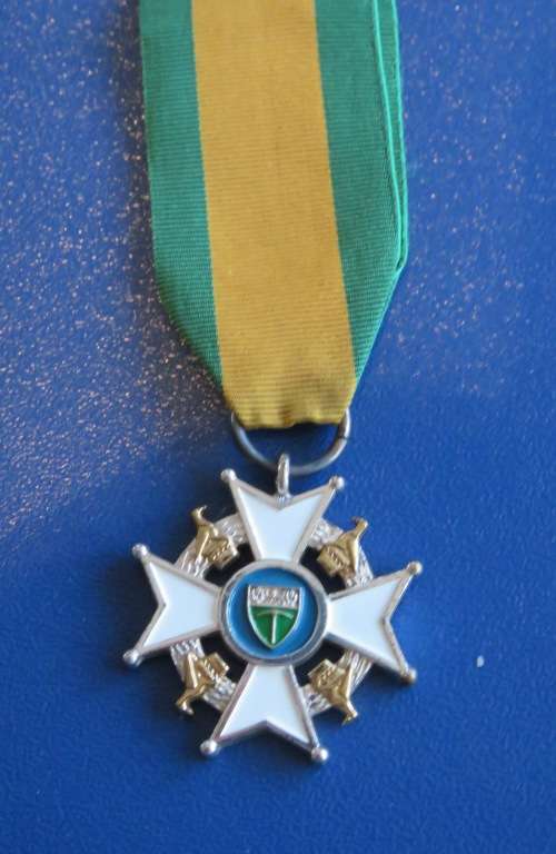 MEMBER OF THE LEGION OF MERIT  (M.L.M.)
