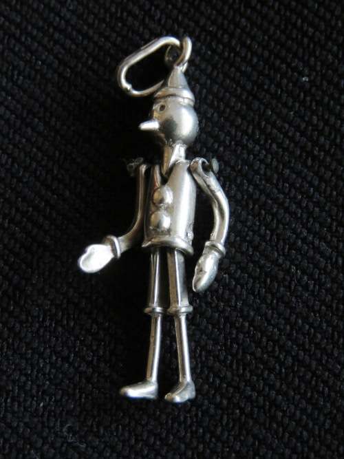 VINTAGE  SILVER ARTICULATED PINOCCHIO CHARM / PENDANT