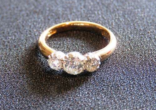 18CT GOLD DRESS RING set with THREE DIAMONDS