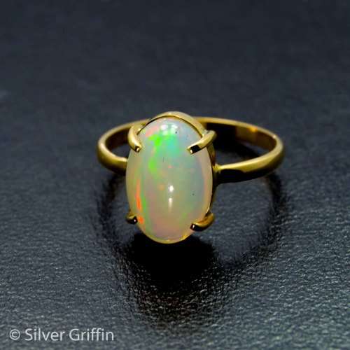 True Beauty only from Silver Griffin 3.97 ct  Natural Ethiopian Opal Set in 9ct Solid Gold.