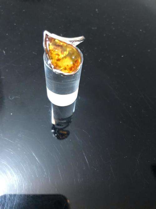 LIGHT COGNAC AMBER SET IN SILVER RING