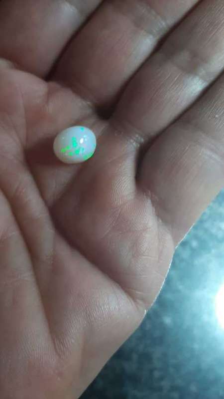 3.5ct ETHIOPIAN OPAL .FREE FORM CUT. QUALITY STONE.