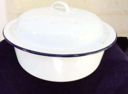 A scarce and  unusual white enamel container
