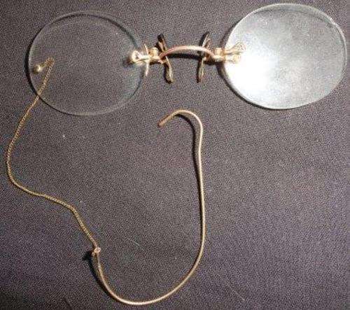 A vintage gold framed  PINCE NEZ in case