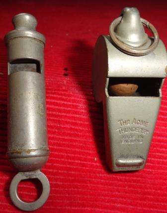Two Acme whistles