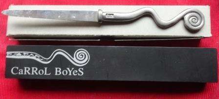 A boxed unused CaRRoL BoYeS letter opener