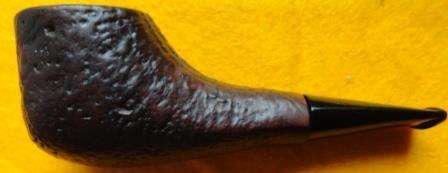 A smoking pipe marked "BORA" -length is only 11 cm (approx)