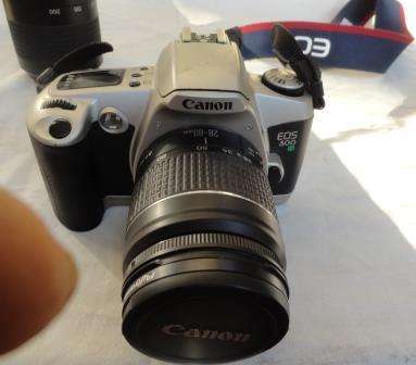 A CANNON EOS 500n camera with loads of accessories. (As is)