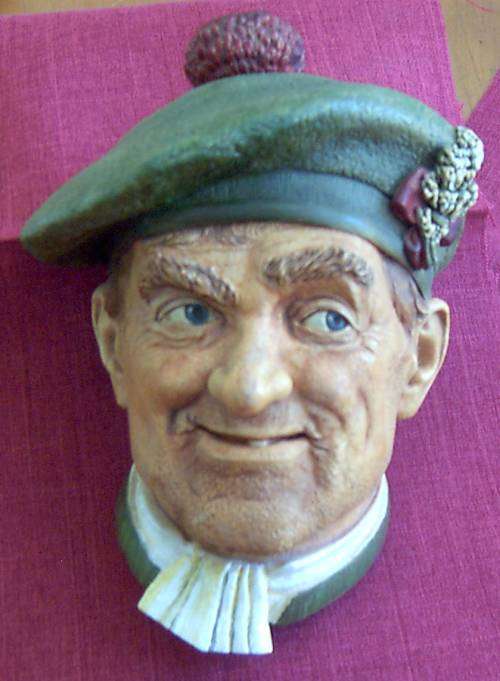 A SET OF THREE BOSSON AND LEGEND FIGURINES