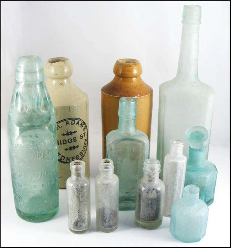 Collection of 11 Antique Glass bottles for the Collector or Decorator!
