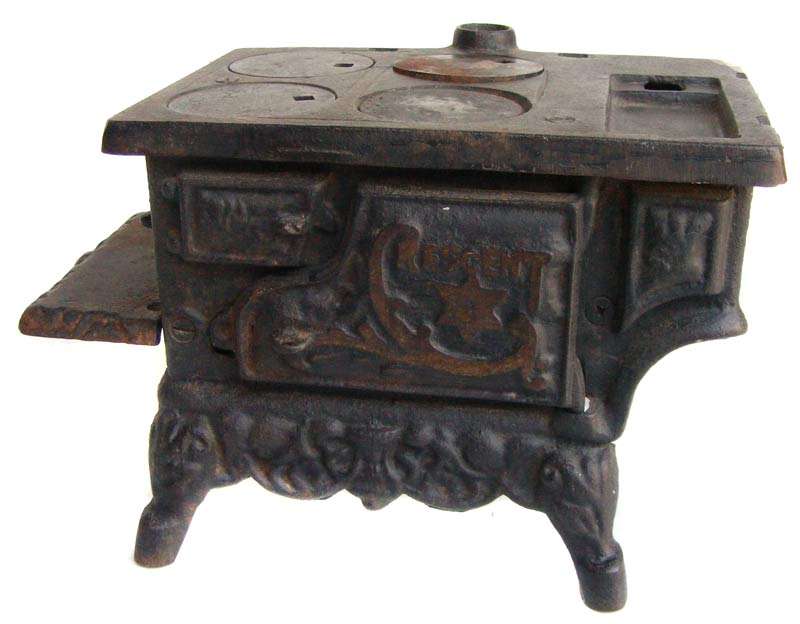 Vintage miniature Crescent cast iron coal stove