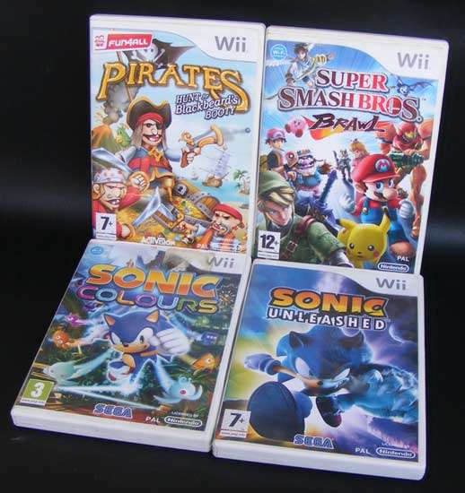 Lot of 4 Nintendo Wii games - Very good condition - Sonic, Pirates, Super smash bros.