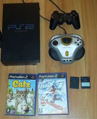 PlayStation 2 + 2 Controllers + 2 Games + MORE