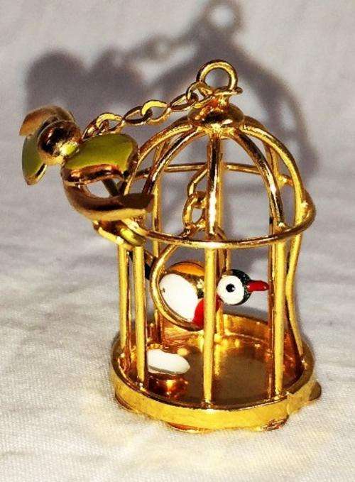 RARE RARE RARE ! MOST UNUSUAL ENAMEL BIRD IN CAGE BROOCH ! BIR SWINGS IN CAGE AND MAKES A CHIME SOUN