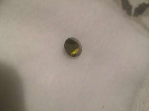 Diamond*** 1.18 Carat, Dark Yellow, Round Brilliant