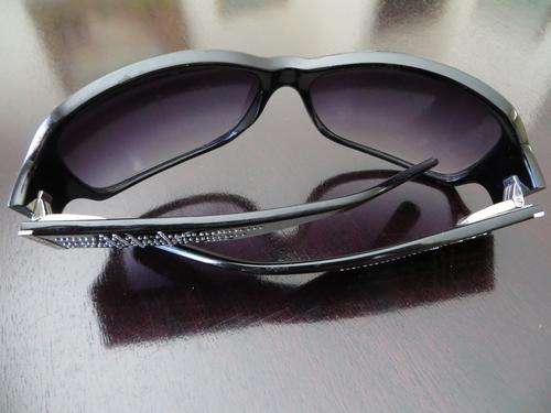 Original fabulous Fossil Ladies Sunglasses...Silver Studded Design.