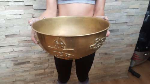 vintage large brass Chinese bowl featuring serpents and calligraphy