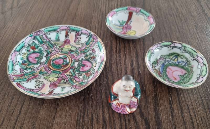 Chinese porcelain plates and miniature Buddha figurine