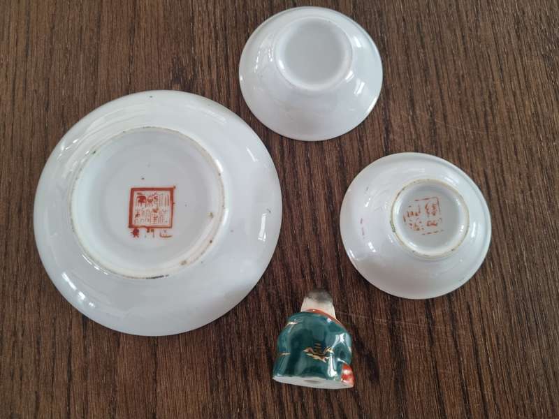 Chinese porcelain plates and miniature Buddha figurine