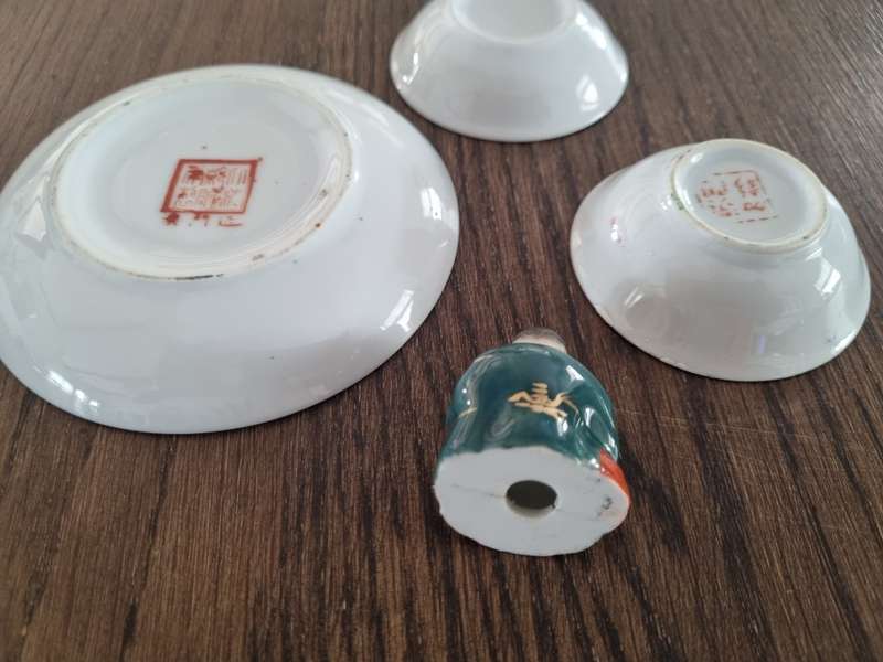 Chinese porcelain plates and miniature Buddha figurine