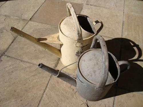 A PAIR OF WATERING CANS