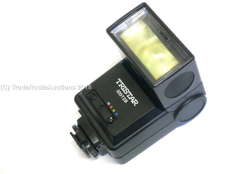 TRISTAR 320TZB Flash will work with canon or nikon