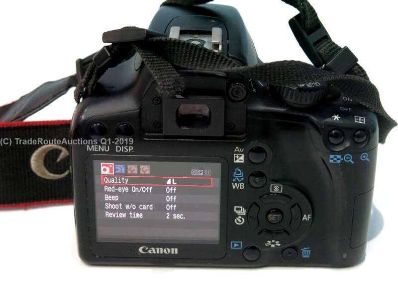 Canon EOS Rebel XS 10.1-Megapixel Digital SLR Camera - Black (Body Only)