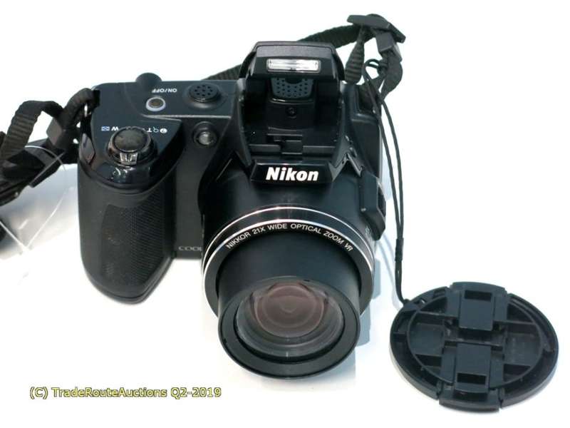 Nikon COOLPIX L120 14.1 MP Digital Camera with 21x NIKKOR Wide-Angle Optical Zoom Lens (RED)
