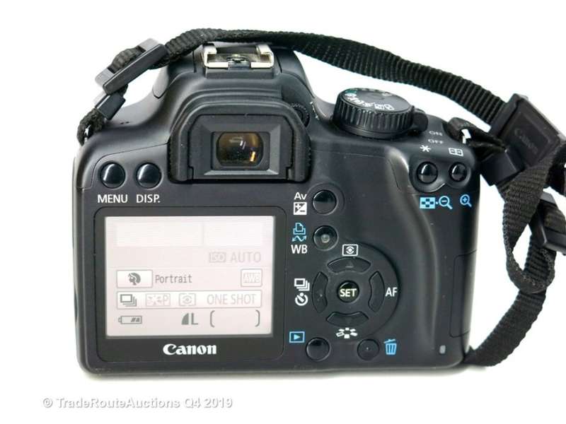 Canon EOS 1000D Digital SLR camera plus Canon 18-55mm Lens Professional KIT