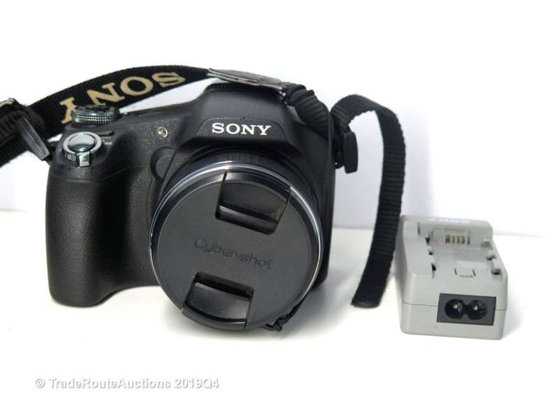 Sony Cyber-Shot DSC-HX100V 16.2 MP Exmor R CMOS Digital Still Camera Carl Zeiss Vario-Tessar Lens