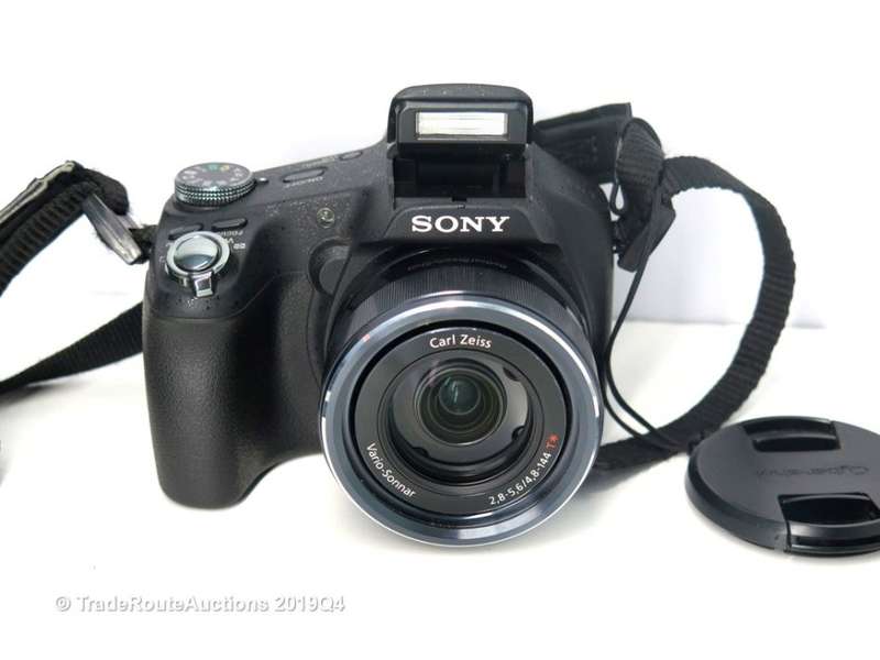 Sony Cyber-Shot DSC-HX100V 16.2 MP Exmor R CMOS Digital Still Camera Carl Zeiss Vario-Tessar Lens