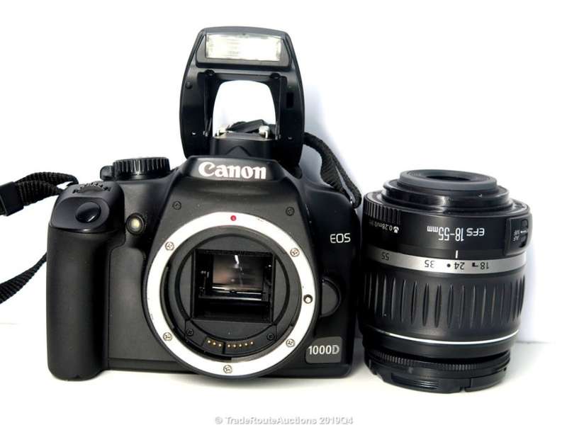 Canon EOS 1000D Digital SLR camera plus Canon 18-55mm Lens Professional KIT