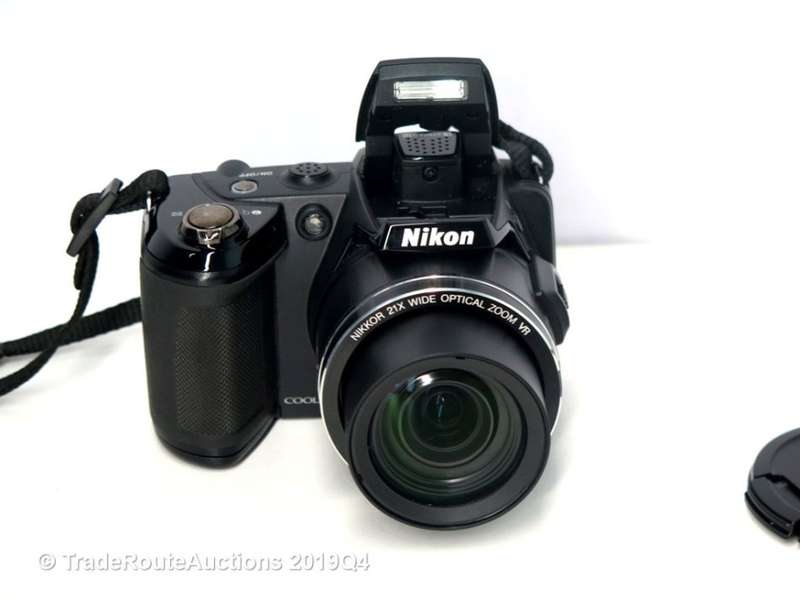 Nikon COOLPIX L120 14.1 MP Digital Camera with 21x NIKKOR Wide-Angle Optical Zoom Lens (RED)