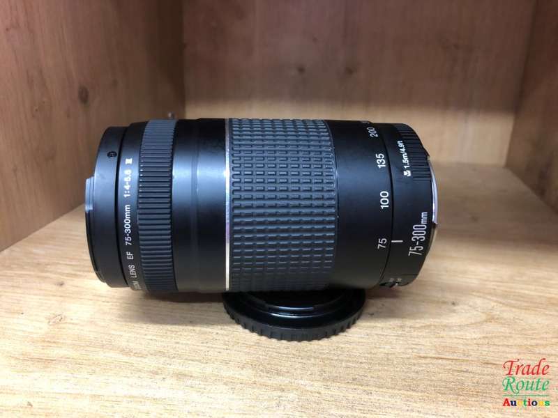 CANON EF 75-300MM ZOOM LENS - PLZ CHECK THE PICTURES FOR CHIPPED FILTER RING