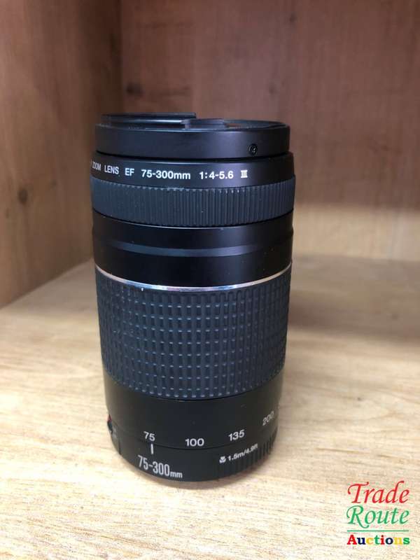CANON EF 75-300MM ZOOM LENS - PLZ CHECK THE PICTURES FOR CHIPPED FILTER RING
