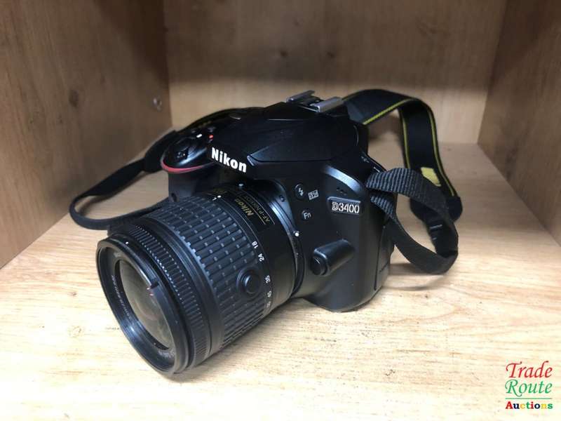 Nikon D3400 24.2 MP CMOS Digital SLR Camera body + Nikon AF-P 18-55 VR Lens Kit