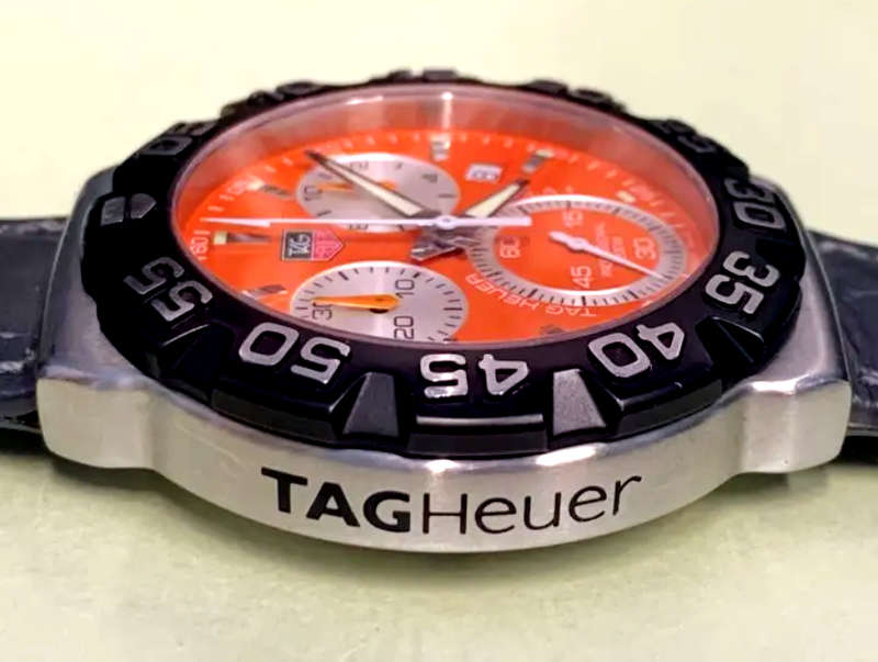 Tag Heuer Professional Orange Dial Formula 1 S/Steel Men's Watch - CAH1113