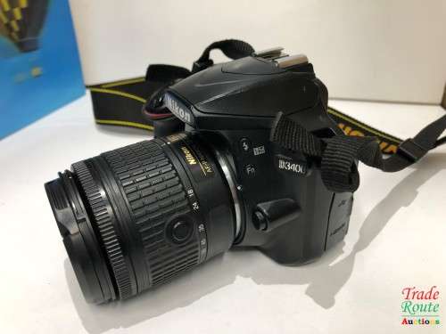 Nikon D3400 24.2 MP CMOS Digital SLR Camera body + Nikon AF-P 18-55 VR Lens Kit